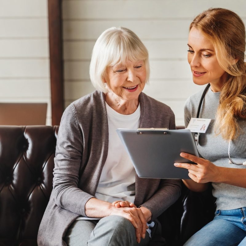 front-view-shot-of-caring-young-woman-nurse-help-old-granny-during-homecare-medical-visit.jpg front-view-shot-of-caring-young-woman-nurse-help-old-granny-during-homecare-medical-visit.jpg